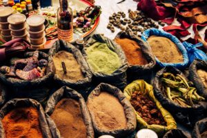 Vivid spices and herbs at an outdoor market in Ngel Nyaki, Nigeria.